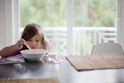 World Food Day child eating cereal