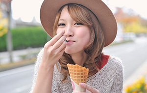 Woman eating ice cream cone